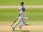 East Zone's captain Ishan Kishan, front, and Anukul Roy run between the wickets on day 2 of the Duleep Trophy 2026-27 final cricket match between South Zone and East Zone(PTI)