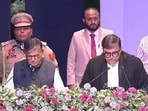 Punjab governor Gulab Chand Kataria administering the oath to justice Ashwani Kumar Mishra as the chief justice of the Punjab and Haryana high court in Chandigarh on Monday. (HT Photo)