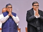 Punjab governor Gulab Chand Kataria with Justice Ashwani Kumar Mishra (right) during the swearing-in ceremony in Chandigarh on Monday. (HT)