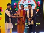 Union Minister for Development of North Eastern Region and Communications, Jyotiraditya Scindia and Sunil Deodhar, founder, My Home India, with singer Lily Sawian from Meghalaya