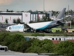 An Amazon cargo plane is seen after it crashed at Miami International Airport on September 6