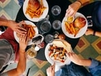 Here's how your dinner timings can impact your early morning cravings.