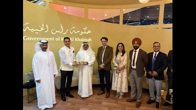 Cabinet minister Aman Arora with dignitaries in Dubai on Monday.