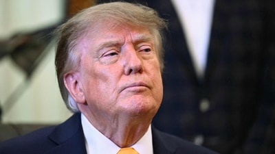 Donald Trump shared AI-generated images and claimed he made hundreds of billions of dollars for the US through stocks. (AFP)