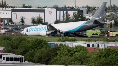 An Amazon cargo plane is seen after it crashed at Miami International Airport on September 6 (AFP)