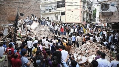 The collapsed building at P-14 Satya Niketan stood on a 55 sq yard plot and had a basement and four floors, according to an MCD report. (HT photo) The collapsed building at P-14 Satya Niketan stood on a 55 sq yard plot and had a basement and four floors, according to an MCD report. (HT photo)