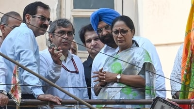 Municipal Corporation of Delhi (MCD) Commissioner Sanjeev Khirwar (2nd from left) at the site of a collapsed building in Satya Niketan, on Monday (Vipin Kumar/Hindustan Times)