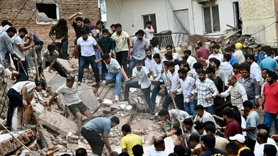 Even when cranes arrived to move bigger chunks of the rubble, the locals and students continued removing the smaller parts to help the rescue mission. (Sanchit Khanna/HT Photo) Even when cranes arrived to move bigger chunks of the rubble, the locals and students continued removing the smaller parts to help the rescue mission. (Sanchit Khanna/HT Photo)