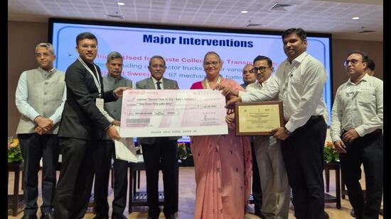 Mayor Sushma Kharkwal and municipal commissioner Gaurav Kumar receive the Clean Air Survey 2026 awards in New Delhi on Monday. (Sourced)