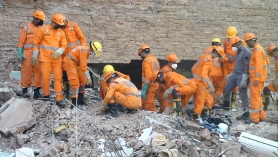 At least six people died, and several others were injured after a five-storey building collapsed in Satya Niketan on Sunday.