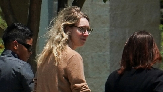 Theranos founder Elizabeth Holmes arrives to begin serving her prison sentence at the Federal Prison Camp in Bryan, Texas, U.S.