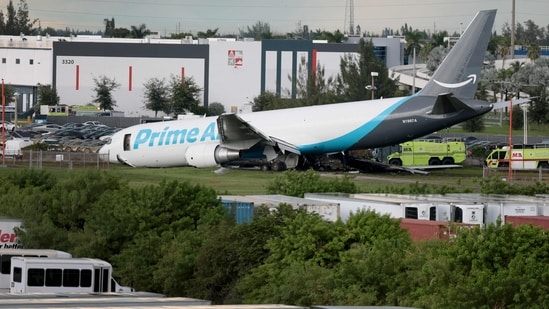 An Amazon cargo plane is seen after it crashed at Miami International Airport on September 6 (AFP)