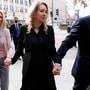 Theranos founder Elizabeth Holmes arrives with her family to be sentenced on her convictions for defrauding investors in the blood testing startup at the federal courthouse in San Jose, California, U.S., November 18, 2022.