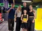 Angelina Jolie was accompanied by her son Knox (extreme left) during her visit to the club in Ukraine's Kharkiv.