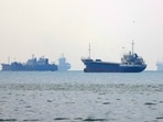 Vessels transit the Hormuz Strait off the coast of Iran's southern port city of Bandar Abbas.