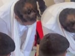 Footage of the incident captured the minister attempting to resuscitate the collapsed employee by administering CPR on the spot. 