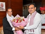 Rajasthan Chief Minister Bhajanlal Sharma greets the newly sworn-in Chief Justice of the state  High Court Sanjay Kumar Agarwal.