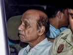 Hariram Gupta, owner of the Satya Niketan building that collapsed on Sunday and claimed the lives of seven people, being taken to South Campus police station.
