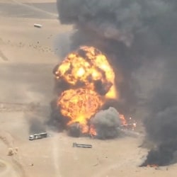 Trucks explode as they burn, during what the Houthis say was an attack targeting trucks coming from Saudi territory, at Al-Wadiah border crossing near Al-Wadiah, on the Saudi-Yemen border.