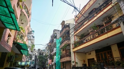 A view of residential buildings and paying guest (PG) accommodations in the Satya Niketan area, where electric meters, wiring and other utility installations are seen exposed. (Sanchit Khanna/HT) A view of residential buildings and paying guest (PG) accommodations in the Satya Niketan area, where electric meters, wiring and other utility installations are seen exposed. (Sanchit Khanna/HT)