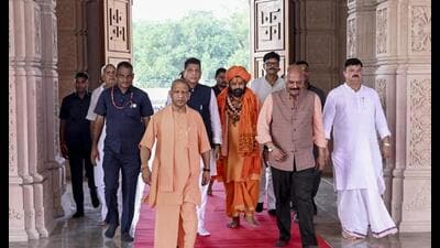 Chief minister Yogi Adityanath with Ram temple trust’s newly appointed CEO Jeetendra Mishra during a visit to Ram temple in Ayodhya. (Handout via PTI Photo) Chief minister Yogi Adityanath with Ram temple trust’s newly appointed CEO Jeetendra Mishra during a visit to Ram temple in Ayodhya. (Handout via PTI Photo)