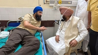 National Commission for Minorities (NCM) chairman Harjit Singh Grewal interacting with Mohanjeet Singh. (HT)
