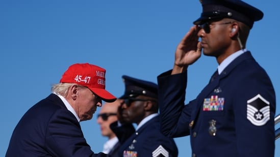 President Donald Trump sparked a row with videos alleging he didn't salute a Marine guarding the helicopter. 