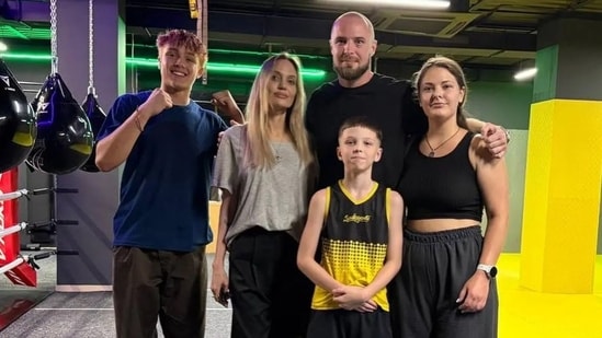 Angelina Jolie was accompanied by her son Knox (extreme left) during her visit to the club in Ukraine's Kharkiv.