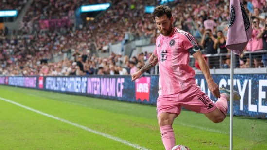 Inter Miami CF forward Lionel Messi (10) shoots a corner kick against Atlanta United during the first half at Nu Stadium