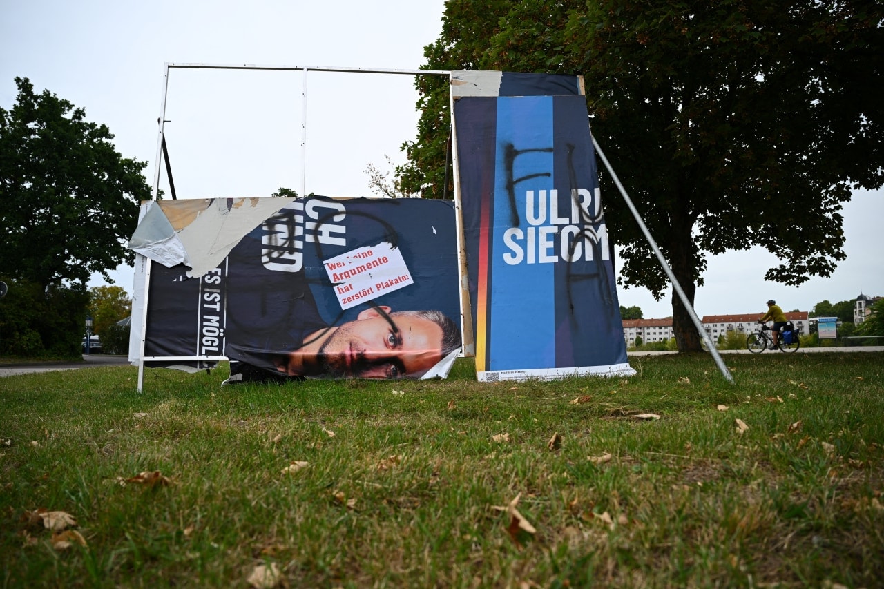 A damaged banner for AfD candidate Ulrich Siegmund in eastern German city of Magdeburg on Monday.