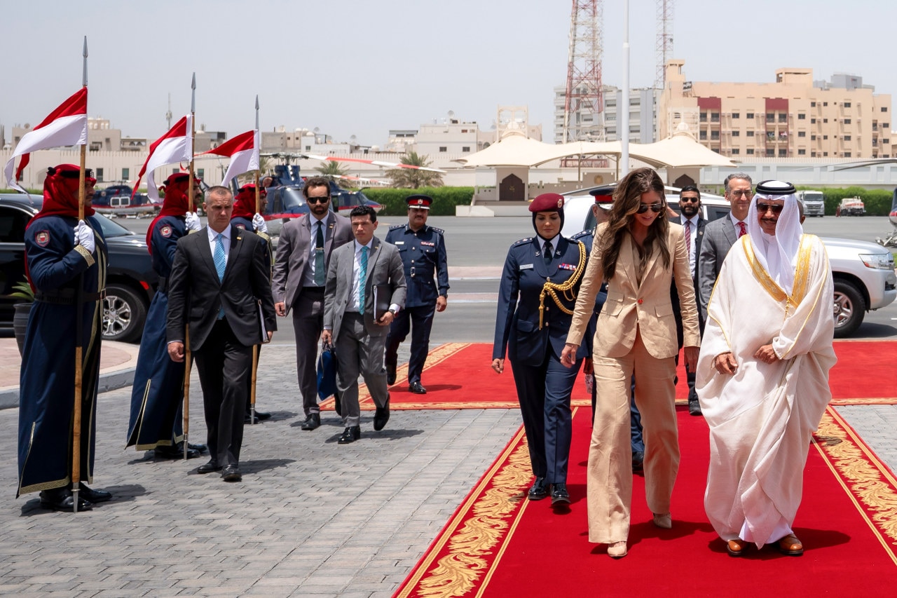 DHS Secretary Kristi Noem and Lewandowski, left, in Bahrain in May 2025. DHS Secretary Kristi Noem and Lewandowski, left, in Bahrain in May 2025.