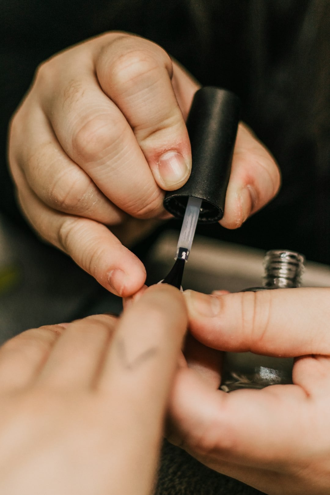 White spots on nails are often related to minor trauma and are not automatically a sign of calcium deficiency. (Unsplash)