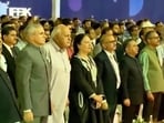 Jammu and Kashmir Chief Minister Omar Abdullah and J&K National Conference president Farooq Abdullah stand for Vande Mataram.
