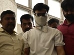Police arrested two men and seized a revolver and six live cartridges after the security breach at Jio World Plaza in Mumbai.