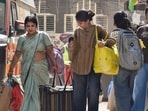 Delhi building collapse LIVE: Students carry their belongings as they vacate their PGs adjacent to the Satya Niketan PG building which collapsed near Delhi University's South Campus.