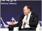 Philippines Defence Secretary Gilberto C Teodoro reads out a note handed to him in the middle of the Seoul Defence Dialogue.