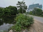 Residents said internal roads need repairs, while vacant plots and a service lane near Aloha Apartments are being used for waste dumping. (Parveen Kumar/HT)