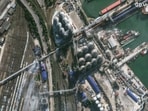 This satellite image provided by Vantor shows smoke in an overview of port infrastructure in Novorossiysk, Russia, Wednesday, Aug. 12, 2026. 