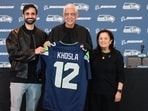 Vinod Khosla now leads the Seahawks with wife Neeru and son Neal after their record $9.612 billion purchase.. (AP Photo/Lindsey Wasson)(AP Photo/Lindsey Wasson)