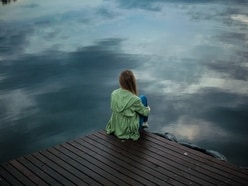The loneliness of being surrounded by people.
