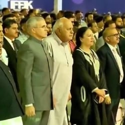 Jammu and Kashmir Chief Minister Omar Abdullah and J&K National Conference president Farooq Abdullah stand for Vande Mataram.