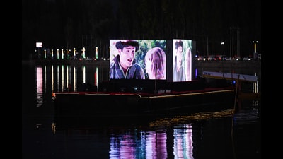 A view of a floating cinema on the waters of Dal Lake, in Srinagar on Wednesday. (ANI) A view of a floating cinema on the waters of Dal Lake, in Srinagar on Wednesday. (ANI)