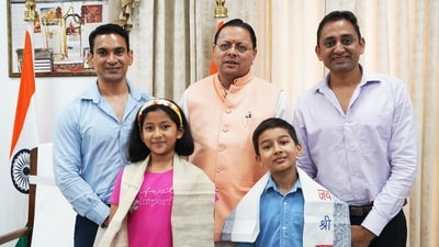 Uttarakhand Chief Minister Pushkar Singh Dhami meets young mountaineers, Reyansh Pant and Prisha Rawat, who successfully scaled Mount Kilimanjaro—the highest peak in Africa located in Tanzania, in Dehradun on Tuesday. (@pushkardhami) Uttarakhand Chief Minister Pushkar Singh Dhami meets young mountaineers, Reyansh Pant and Prisha Rawat, who successfully scaled Mount Kilimanjaro—the highest peak in Africa located in Tanzania, in Dehradun on Tuesday. (@pushkardhami)