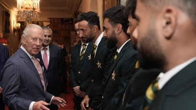 Britain's King Charles III speaks with members of the Pakistan National Cricket Team. (AFP) Britain's King Charles III speaks with members of the Pakistan National Cricket Team. (AFP)
