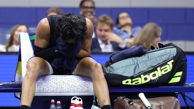 Carlos Alcaraz of Spain appears to be sick in his match against Ben Shelton of the United States during their Men's Singles Quarterfinal match on Day Ten of the 2026 US Open (Getty Images via AFP) Carlos Alcaraz of Spain appears to be sick in his match against Ben Shelton of the United States during their Men's Singles Quarterfinal match on Day Ten of the 2026 US Open (Getty Images via AFP)