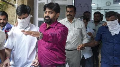 Mumbai: Police arrest Rohan Parekh, 24, left masked, masked, and Dilip Raja Kunde, 49, right masked, after they allegedly forced entry into a shopping mall in Bandra-Kurla Complex (BKC) while carrying a firearm, in Mumbai, Tuesday, Sept. 8, 2026. (PTI Photo/Shashank Parade)(PTI09_08_2026_000382B) (PTI) Mumbai: Police arrest Rohan Parekh, 24, left masked, masked, and Dilip Raja Kunde, 49, right masked, after they allegedly forced entry into a shopping mall in Bandra-Kurla Complex (BKC) while carrying a firearm, in Mumbai, Tuesday, Sept. 8, 2026. (PTI Photo/Shashank Parade)(PTI09_08_2026_000382B) (PTI)