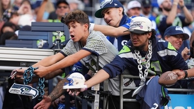 Fans call out for autographs before an NFL football game between the Seattle Seahawks and the New England Patriots, Wednesday, Sept. 9, 2026, in Seattle. (AP Photo/Lindsey Wasson) (AP Photo/Lindsey Wasson) Fans call out for autographs before an NFL football game between the Seattle Seahawks and the New England Patriots, Wednesday, Sept. 9, 2026, in Seattle. (AP Photo/Lindsey Wasson) (AP Photo/Lindsey Wasson)