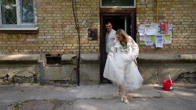 As the couple slept, a Russian strike hit a warehouse across the street from their building. (AP Photo) As the couple slept, a Russian strike hit a warehouse across the street from their building. (AP Photo)