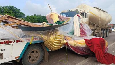 The collision also damaged the Ganesh idol being transported by the towing vehicle. The collision also damaged the Ganesh idol being transported by the towing vehicle.