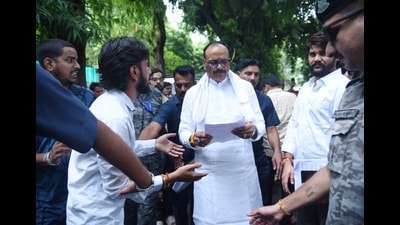 UP deputy CM Brajesh Pathak meeting protesters outside his residence in Lucknow on Tuesday. (HT Photo) UP deputy CM Brajesh Pathak meeting protesters outside his residence in Lucknow on Tuesday. (HT Photo)